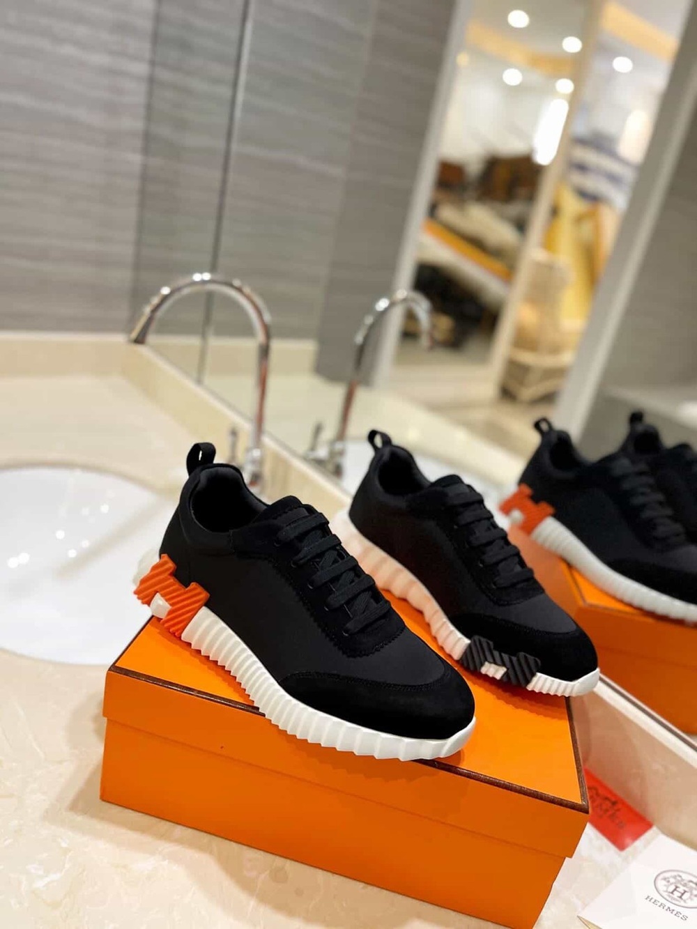Hermes Black Sneakers with Orange Heel Accents